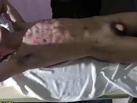 Straight Asian men enjoying hot wax treatment