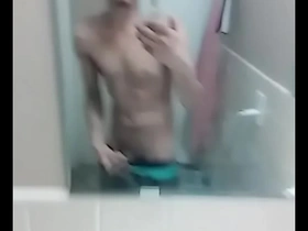 Gay bathroom scene with an Asian guy and a black guy with a big cock.
